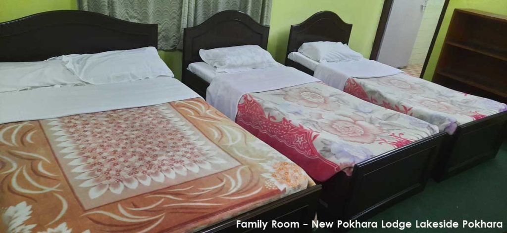 Family Room with 3 beds at the Hostel - New Pokhara Lodge, Lakeside Pokhara
